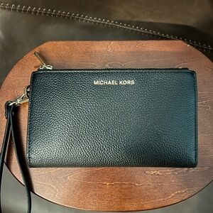Micheal Kors wristlet.